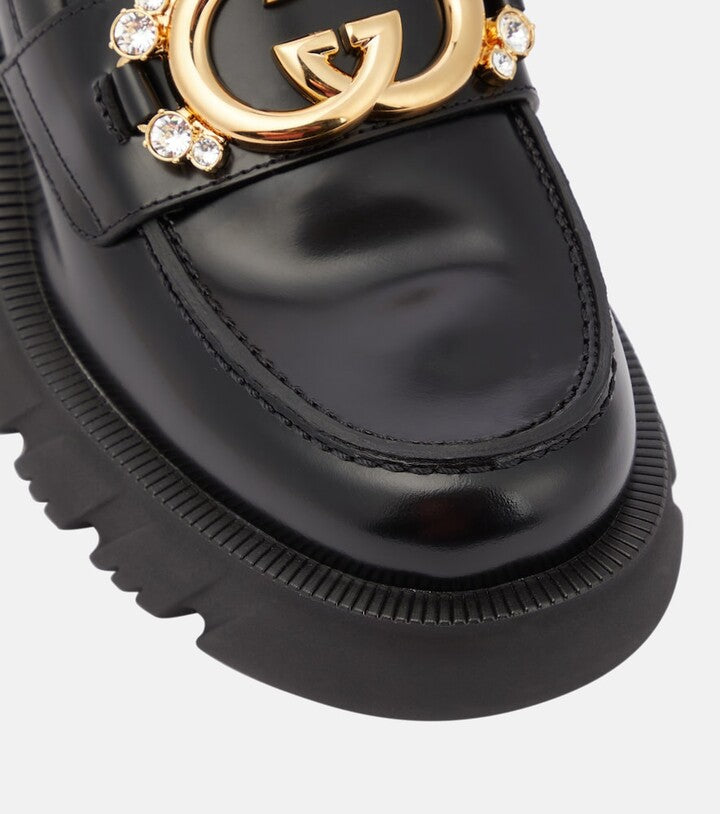 GUCCI
Interlocking G leather loafers
