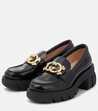 GUCCI
Interlocking G leather loafers
