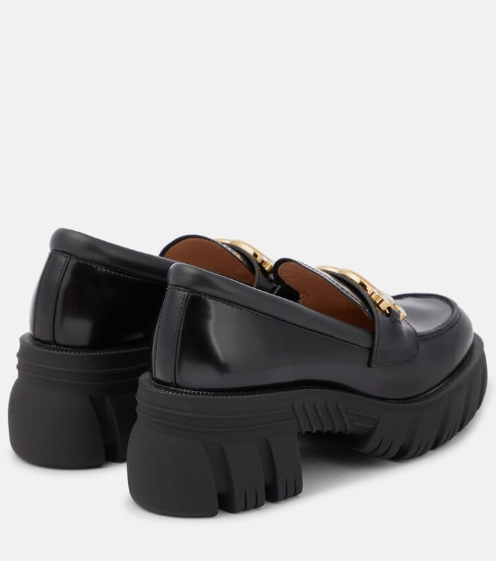 GUCCI
Interlocking G leather loafers
