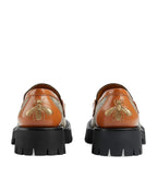 GUCCI
GG Supreme Canvas Lug-Sole Loafers